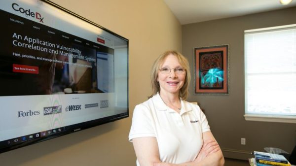 Photo of Anita D'Amico CEO of Code Dx, Inc. in her Northport office
